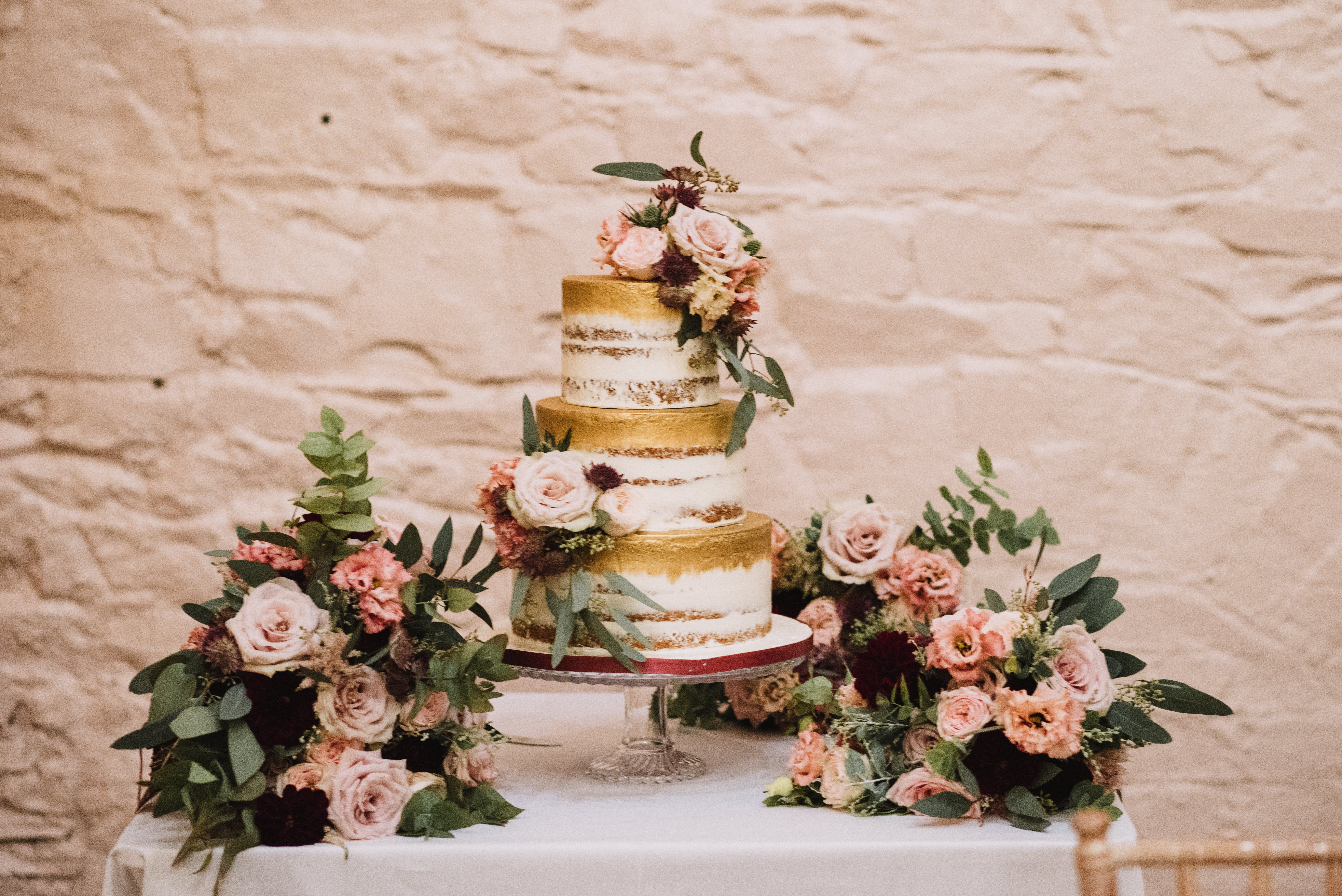 Stunning 3 tier wedding cake in the barn at Larchfield Estate