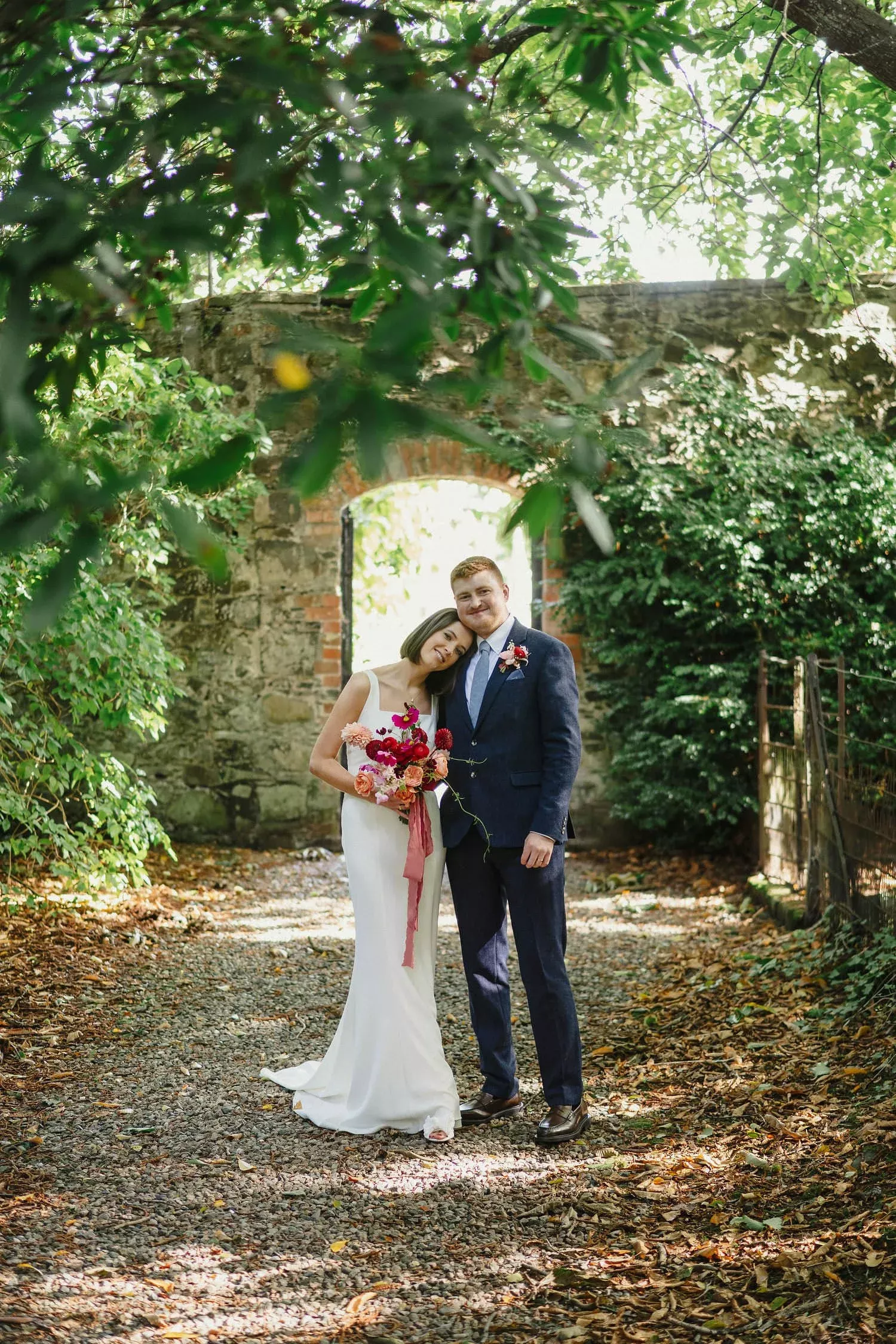 Bridal Couple at Walkway to lake At Larchfield Estate Wedding Venue Northern Ireland