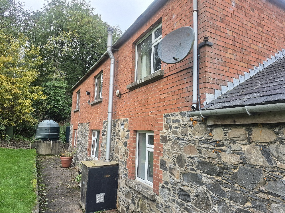 Back of Gamekeepers Cottage with its spacious garden